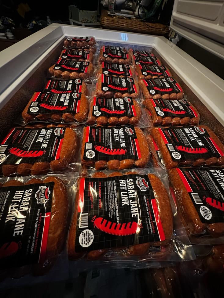 Large freezer holding sausages (Up-Close)