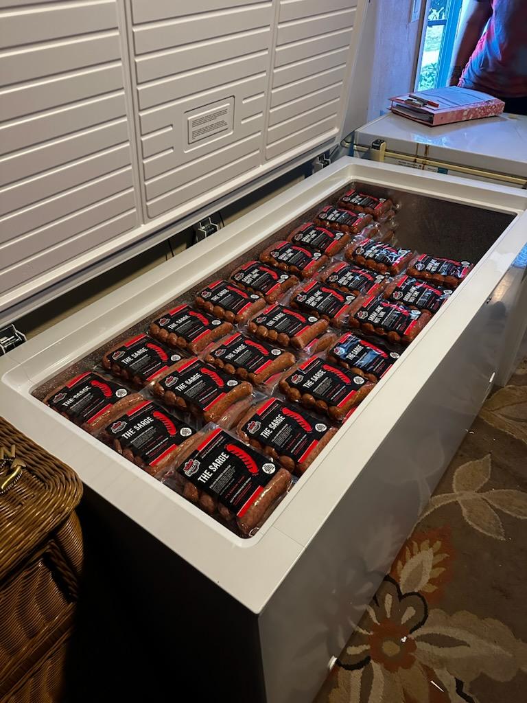 Large freezer holding sausages