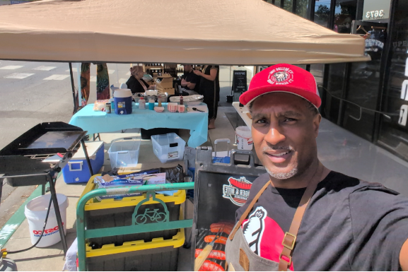 Our founder, Malcolm, posing at a pop up event